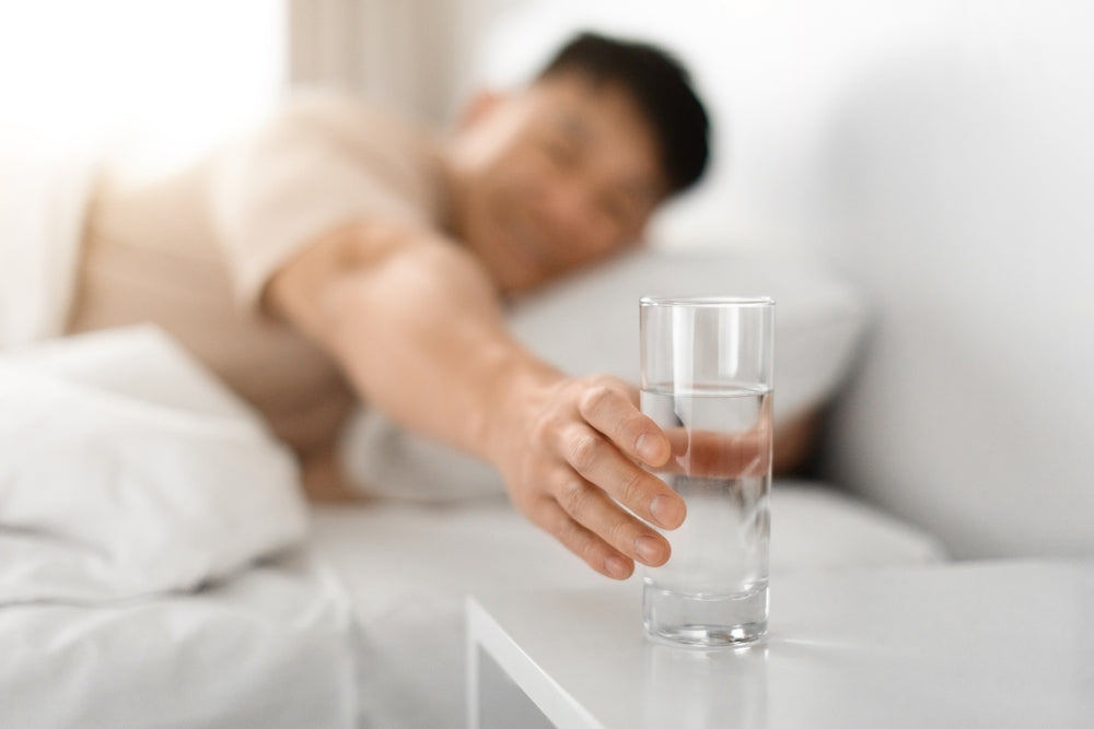 Healthy,Asian,Middle,Aged,Man,Lying,In,Bed,At,Home,